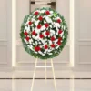 Corona de flores para difuntos en diseño elegante con entrega a domicilio en CDMX.