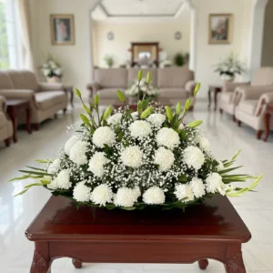 Mi mas sentido pesame amiga con crisantemos y lilis en arreglo floral elegante entrega express en la ciudad de México