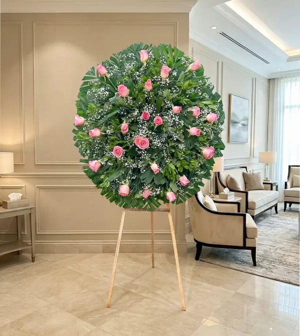Corona rosas rosas para entrega express en la Ciudad de México, ideal para velatorios y panteones.